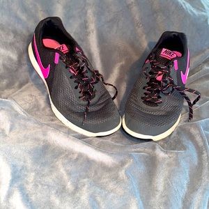 Black and hot pink Nikes